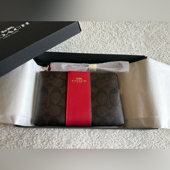 Coach Handbags - NEW COACH Signature Coated Canvas with Leather Strap Brown and Red Wristlet